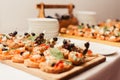 Buffet table. Lots of different sandwiches close up. Food