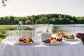 A buffet table in the open air with light snacks