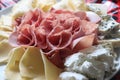 buffet table plate with ham, salami and cheese eidam niva Royalty Free Stock Photo