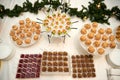Buffet table with snacks, canape and appetizers at luxury Christmas party, copy space. Serving food and appetizers at restaurant. Royalty Free Stock Photo