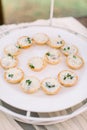 Buffet table with snacks at rustic wedding reception. Serving food at event. Catering banquet table Royalty Free Stock Photo