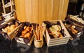Buffet table with variety of bread in the wooden baskets Royalty Free Stock Photo
