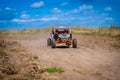 Buggy extreme riding in sandy track. UTV, 4x4, rally