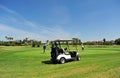 Buggy and golfers at Costa Ballena Golf course, Rota, Cadiz province, Spaingreen, Royalty Free Stock Photo