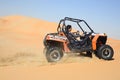 Buggy racing across desert Royalty Free Stock Photo