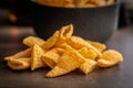 Bugles snack. Cone corn chips on kitchen table Royalty Free Stock Photo