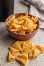 Bugles snack. Cone corn chips on kitchen table Royalty Free Stock Photo