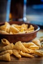 Bugles snack. Cone corn chips on wooden table Royalty Free Stock Photo