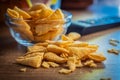 Bugles snack. Cone corn chips on wooden table Royalty Free Stock Photo