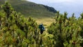 Girl hiking through the beautiful mountains of Buila Vanturarita National Park