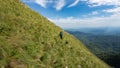 Girl hiking through the beautiful mountains of Buila Vanturarita National Park