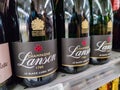 Close-up on bottles of Lanson brand champagnes from the shelf of a supermarket in France Royalty Free Stock Photo