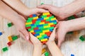 Build a designer Lego heart. Selective background Royalty Free Stock Photo