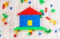 Build a designer Lego house. Selective background Royalty Free Stock Photo