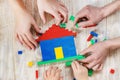 Build a designer Lego house. Selective background Royalty Free Stock Photo