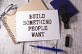 Build something people want.text on white notepad on craft background Royalty Free Stock Photo