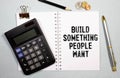 Build something people want.text on white notepad on craft background Royalty Free Stock Photo