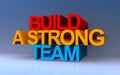 Build a strong team on blue Royalty Free Stock Photo