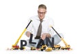 Build up a plan: Businessman building plan-word.