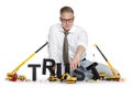 Build up trust: Businessman building trust-word. Royalty Free Stock Photo
