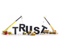 Build up trust: Machines building trust-word. Royalty Free Stock Photo