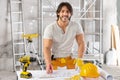 Builder or architect working on a blueprint Royalty Free Stock Photo