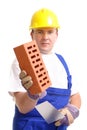Builder with brick and trowel Royalty Free Stock Photo
