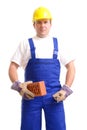 Builder with brick and trowel Royalty Free Stock Photo