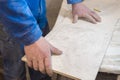 Builder bricklayer installs ceramic tiles. Apartment renovation