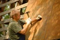 Builder or carpenter working and builds a roof Royalty Free Stock Photo