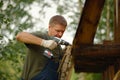 Builder or carpenter working and builds a roof Royalty Free Stock Photo