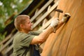 Builder or carpenter working and builds a roof Royalty Free Stock Photo