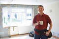 Builder Carrying Out Home Improvements Taking A Break Royalty Free Stock Photo