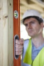 Builder Checking Work With Spirit Level Royalty Free Stock Photo