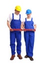 Builder couple with level Royalty Free Stock Photo