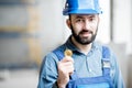 Builder with cryptocoin Royalty Free Stock Photo