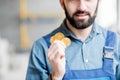 Builder with cryptocoin Royalty Free Stock Photo