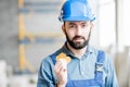 Builder with cryptocoin Royalty Free Stock Photo