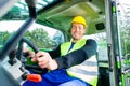 Builder driving construction machinery