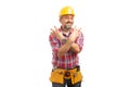 Builder with eight fingers up and crossed arms