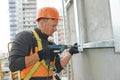 Builder at facade construction work Royalty Free Stock Photo