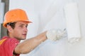 Builder facade painter at work Royalty Free Stock Photo