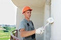 Builder facade plasterer worker