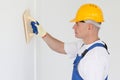 Builder with grinding tool Royalty Free Stock Photo