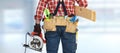 Builder handyman with electric saw. Royalty Free Stock Photo