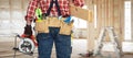 Builder handyman with electric saw. Royalty Free Stock Photo