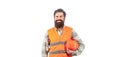 Builder in hard hat, foreman or repairman in the helmet. Bearded man worker in building helmet or hard hat. Portrait of Royalty Free Stock Photo