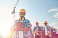 Builder in hardhat with tablet pc at construction Royalty Free Stock Photo