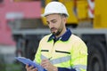 builder in helmet ensuring safety on construction site