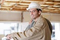 builder holding spool wire Royalty Free Stock Photo